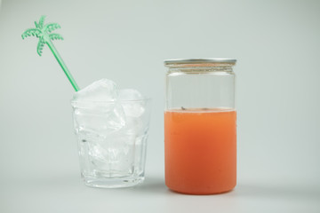 Plastic glass of iced peach soda