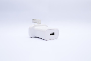 White USB charger head/adapter isolated on a white background