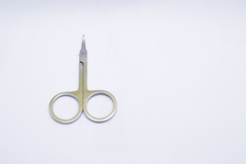 manicure scissors isolated on white background, shot from a 45 degree angle
