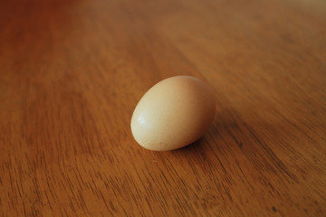 Eggs on wooden table background, shot from a 45 degree angle, with rule of third