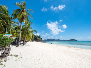 Tropical beach with white sand on the Malcapuya Island, Busuanga, Palawan, Philippines. Beautiful tropical island with sand beach. Travel concept. November, 2018