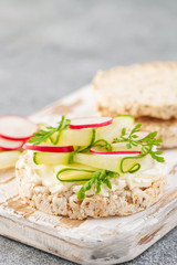 Healthy sandwiches with soft cheese and  vegetables