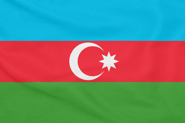 Flag of Azerbaijan on textured fabric. Patriotic symbol