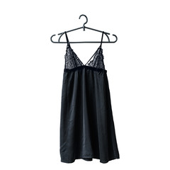 Black lace nightie on the hanger. White background. Isolate