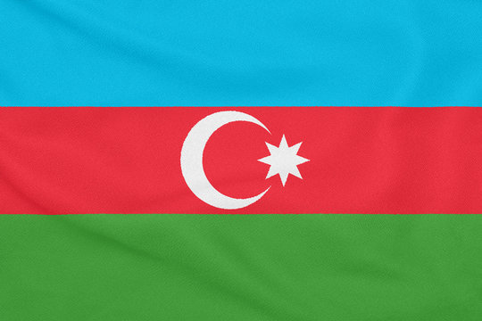 Flag of Azerbaijan on textured fabric. Patriotic symbol