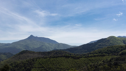 Green mountain plain landscape on a blue sky in Catalonian Pyrenees