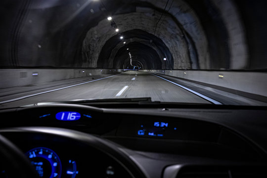 Driver View Inside A Car Driving On A Tunnel Highway