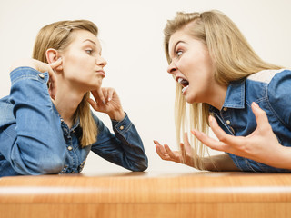Two women having argue fight