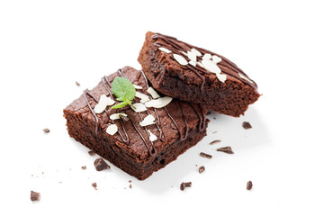 Homemade brownie with dark chocolate isolated on white background.
