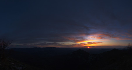 The natural background of the secret light of the evening sky on the panoramic viewpoint, can see the surrounding atmosphere (trees, mountains, clouds) 