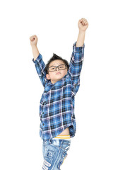 Little boy in glasses raise hands up on white background on isolated