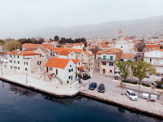 Obraz premium Drone shot of the Kastel old town on the coast of Dalmatia,Croatia . A famous tourist destination on the Adriatic sea.