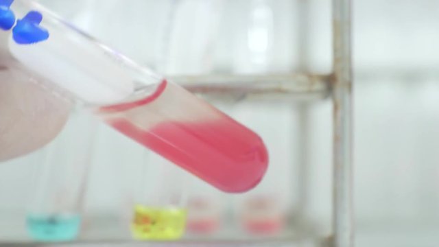 Test tube blood group testing in laboratory science concept.