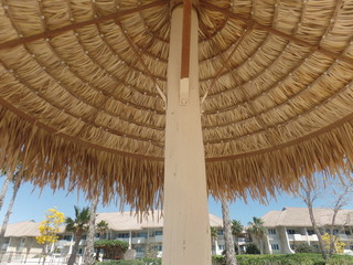 Beach umbrellas at a luxury island holiday resort