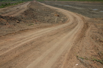 Naklejka premium The dirt road used for suburban traffic in Thailand - Image