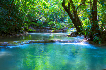 Erawan Waterfall in green forest