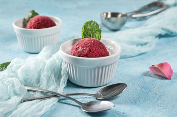 Berry ice cream or sorbet on rustic background