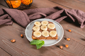 Sweet, tasty sandwich with chocolate and banana