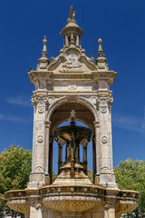 Fototapeta na wymiar Old baroque fountain on the square in the historic town of Chateaudun, France