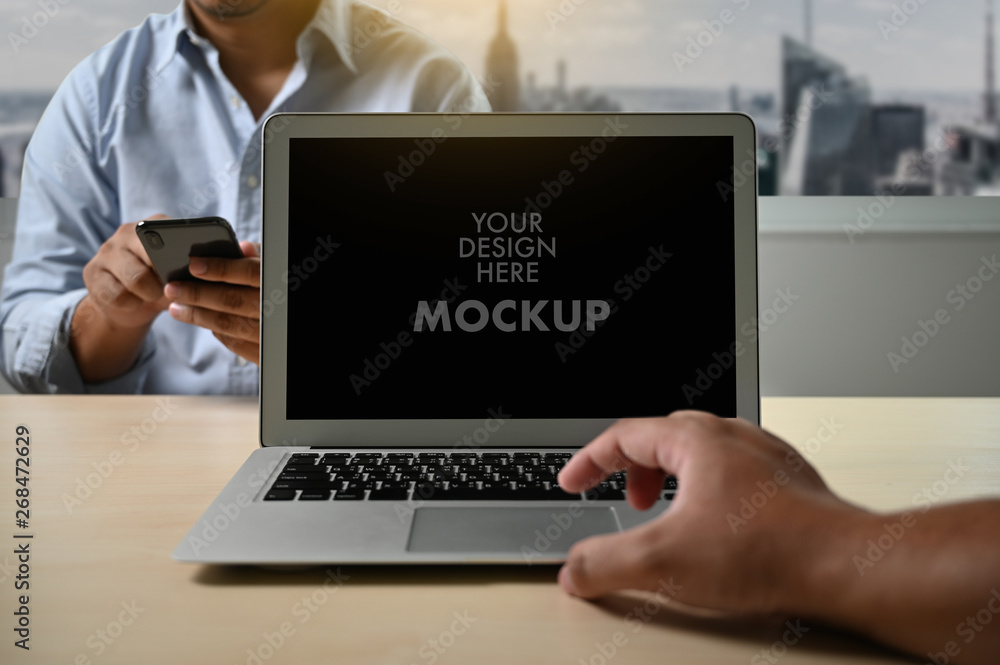 Poster mockup image of business laptop with blank screen on table blank copy space screen for your advertis
