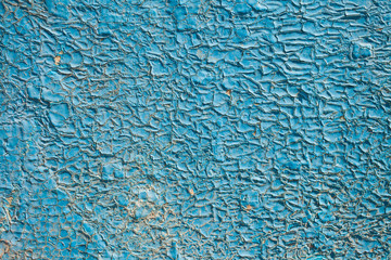 Old peeling blue wall, texture background