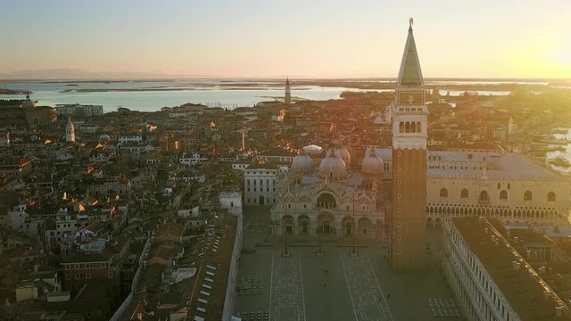aerial view of venice st mark square drone coming out from an old balcony italy