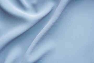 light blue fabric with large folds, abstract background