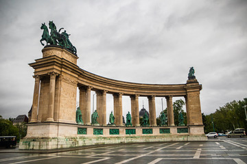 Fototapeta na wymiar Heroes square in Budapest, cloudy rain day. Budapest is a capital and largest town in a Hungary.