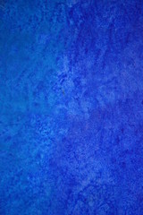 Zoom on a blue painted wall in a modern building