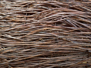 wall of wicker vines and branches. texture, background or pattern