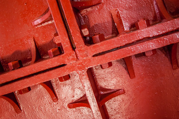 The inside of a red cast iron lighthouse.