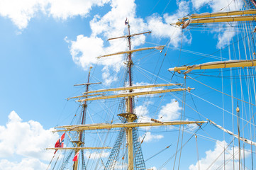 Masts of an old wooden sail ship.