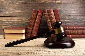 Law and Justice, Legality concept, Judge Gavel on a wooden background, Law library concept.