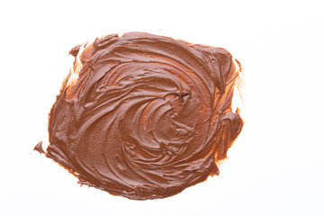 Chocolate cream isolated on white background. Flat lay.