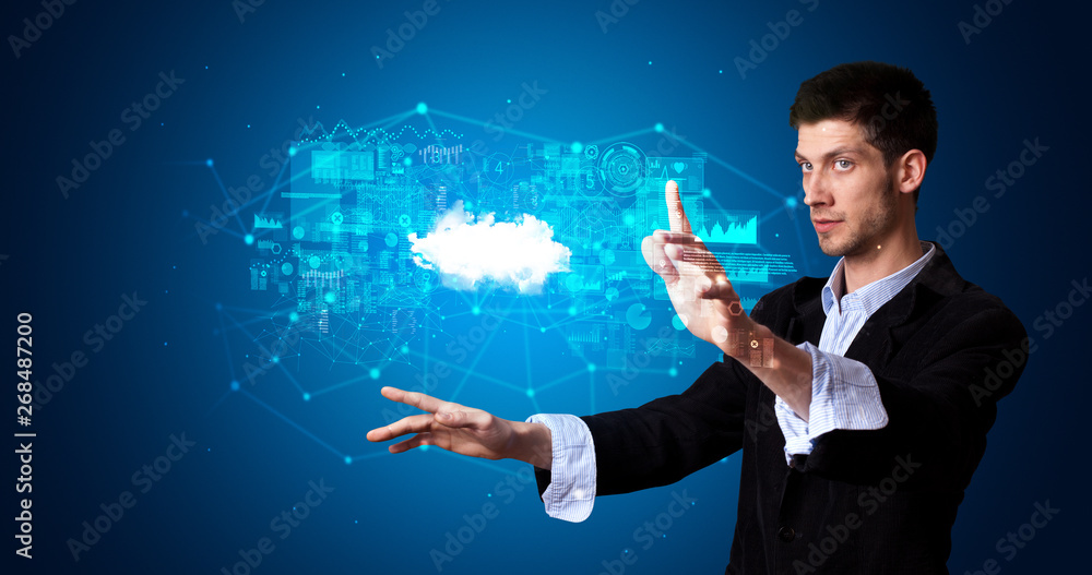Aufkleber Man touching hologram projection displaying information from cloud based system
