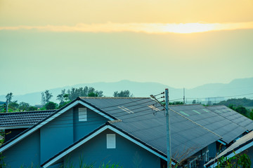 Top view roof of modern village with sunset sky, New modern town home style, Beautiful house in dawn sky, Born of new home village show of expansion of business background concept