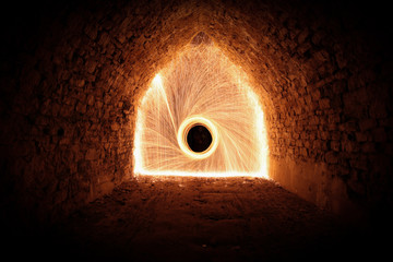 steel wool in motion. light patern in cave