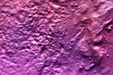 High resolution texture of colorful graffiti paint on conrete and brick walls in red blue purple...