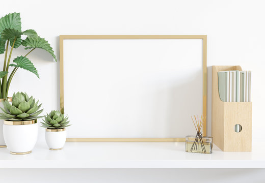 Golden frame leaning on white shelve in interior with plants and books mockup 3D rendering