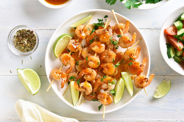 Prawns skewers with sauce