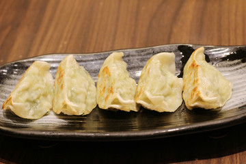 Japanese gyoza or dumplings with soy sauce - Japanese food style 