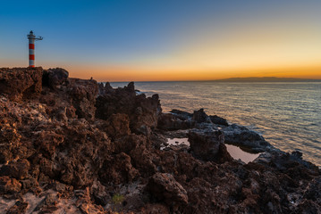 Fototapeta na wymiar Lighthouse In Punta de Abona at sunrise, Tenerife Island, Spain