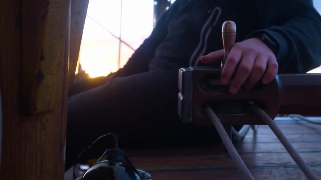 Sailing Action Shot Close Up Hand On Steering Bar.