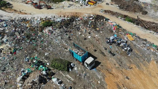 Plastic garbage dumped in landfill. Plastic trash is dumped in Malaysia. Environmental problem because of no recycling