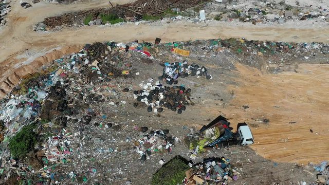 Plastic garbage dumped in landfill. Plastic trash is dumped in Malaysia. Environmental problem because of no recycling