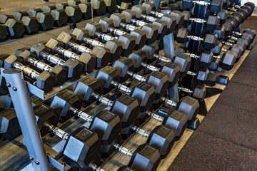 Different weight dumbbells. Sports Equipment