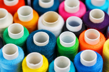 Colorful spools of sewing thread. Colored thread for sewing