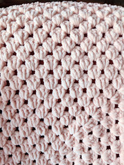 closeup of baby blanket with knitting pattern