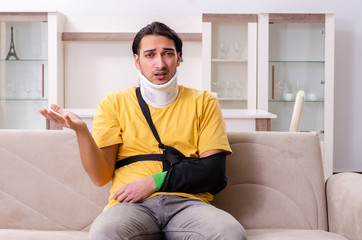 Young man after car accident suffering at home 