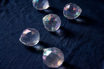 Group, set of geometric shapes, Platonic body, polyhedra, polygonal objects of metals and glass, gold, silver, bronze and stone